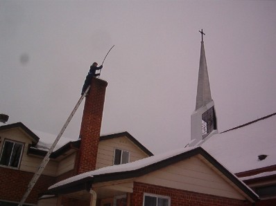 sweeping a chimney fireplace